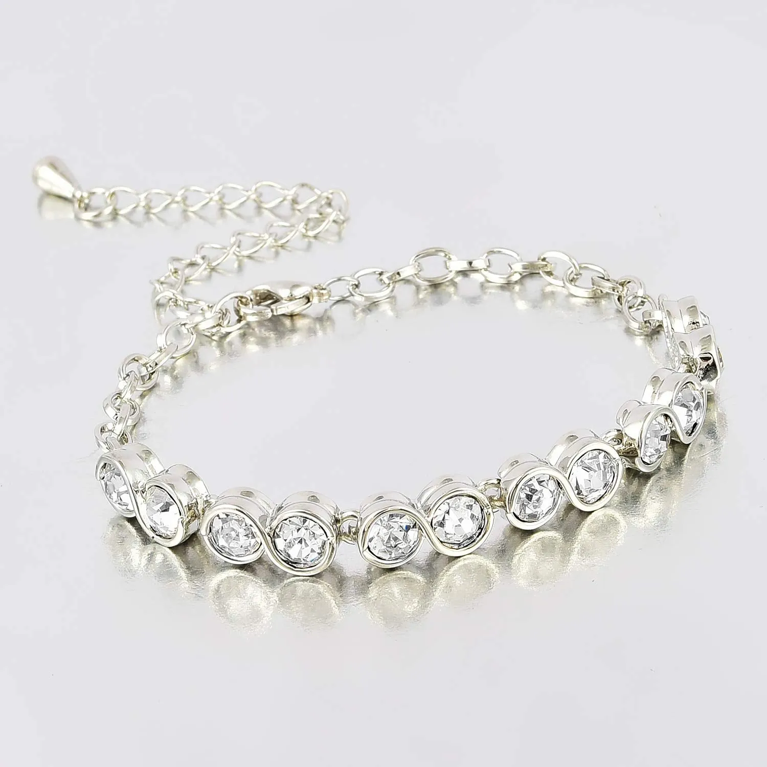 Yellow Chimes Crystals Studded Silver Tennis Bracelet For Women And Girls.